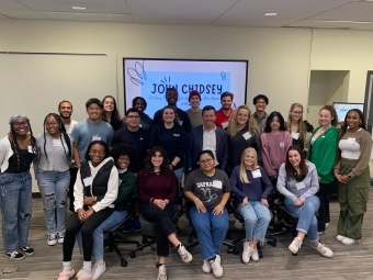 Chidsey Leadership Fellows with Speaker in Classroom