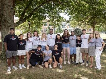 Students wearing tshirts with the new visual identity