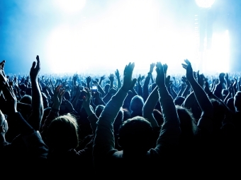 concert goers stock photography