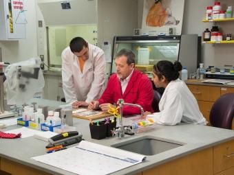 Julio Ramirez working in lab