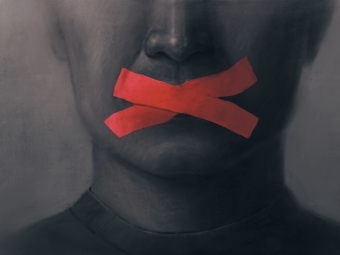 Image of a person with tape over their mouths representing Free Speech