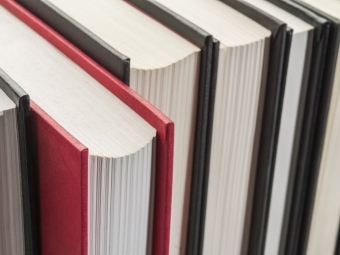 Red book on bookshelf