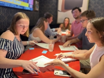 A group of students meeting around a table