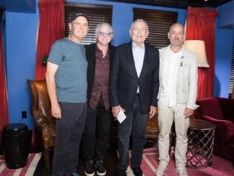 Bertis (left) joined R.E.M. (pictured are Mike Mills and Michael Stipe) on a promo tour. The photo was taken after an interview with Dan Rather, circa 2018.