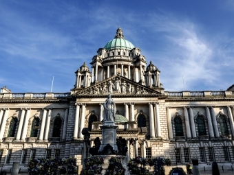 a large state building with columns and a domed roof