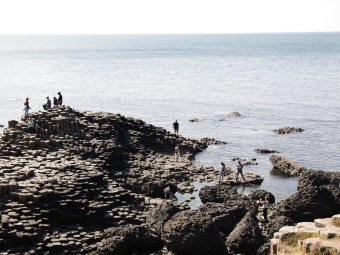 an ocean view of rocky cliffs