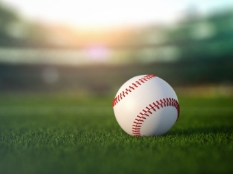 Baseball on green grass