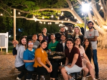 Vail Commons Night Owl Breakfast Students eating at night outside