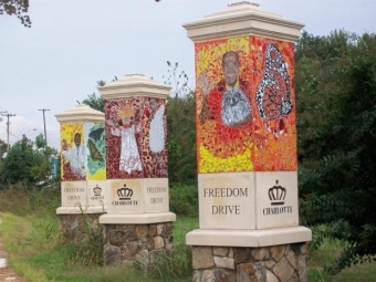 decorated pillars that read "Freedom Drive"