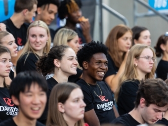 Students smiling at the Charlotte FC game