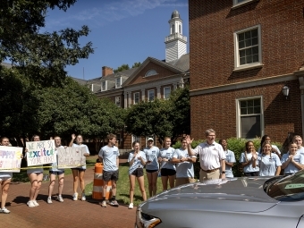 Students holding posters at 2024 move-in