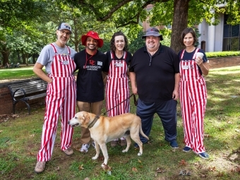 Chaplains wearing striped overalls