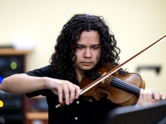 Anthony Strouse playing violin