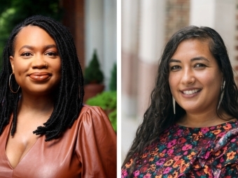 two women smiling outside
