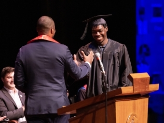 Two men Shaking hands at Convocation 2025