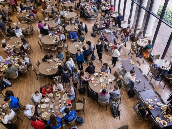 an overhead view of tables in a dining hall
