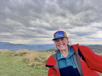 Caitlin Stehn ’24 with a big sky behind her