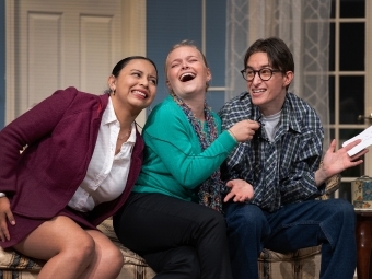 a group of students perform on stage