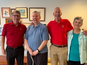 L-r: President Doug Hicks ’90, Professor Emeritus of Political Science Lou Ortmayer, Steven Porter ’79, Carolyn Ortmayer