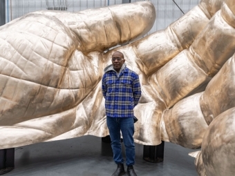 Artist Hank Willis Thomas at the Walla Walla Foundry to review progress on the sculpture, shown here before application of the bronze patina.