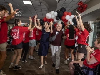 Opening session Orientation 2025 parents getting cheered by orientation leaderes