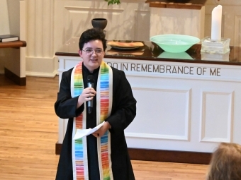 Gray McGill ’20 speaking into microphone