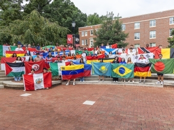 Students holding flags 