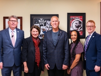 President Doug Hicks with Senator Amy Klobuchar (D) of Minnesota and Senator Thom Tillis (R) of North Carolina, MarQuita Barker and Chris Marsicano 