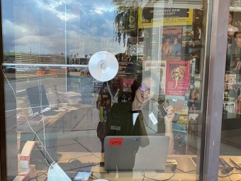 a young man works the box office at a film festival
