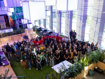 Group of students at Truist event in modern atrium