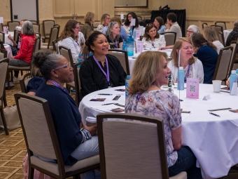 People sitting in a conference room