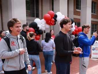 All In for Davidson 2026 Students watch activities outside the Union