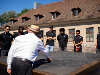 Davidson College Basketball team visits the Sachsenhausen concentration camp.