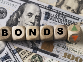 The word Bonds Getty Stock Image with American cash in the background