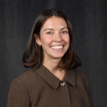 a young woman with short brown hair