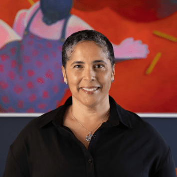 a headshot of Shirley Collado