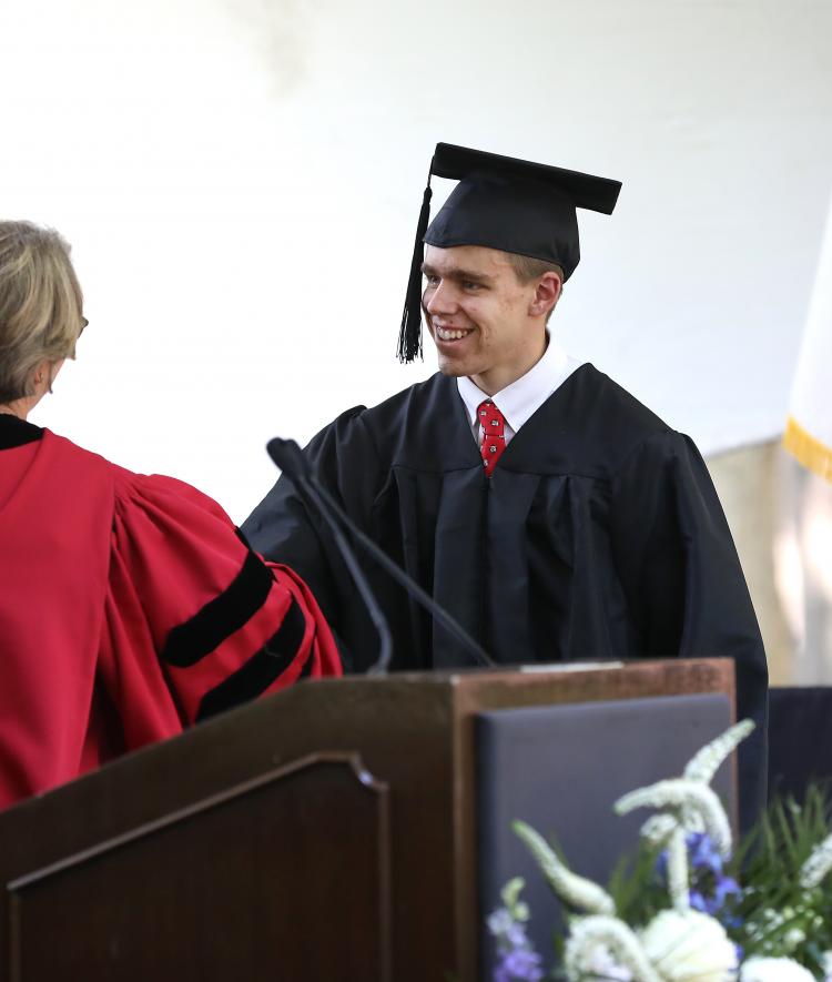 Henry Brooks receives diploma