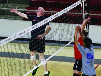 Physics Professor Dan Boye playing in the Recreational Volleyball Team