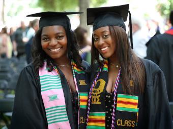 Pair of grads at Commencement 2020